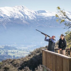 Break One Clay Target Shooting Instructor helping man fire the Ugly Gun