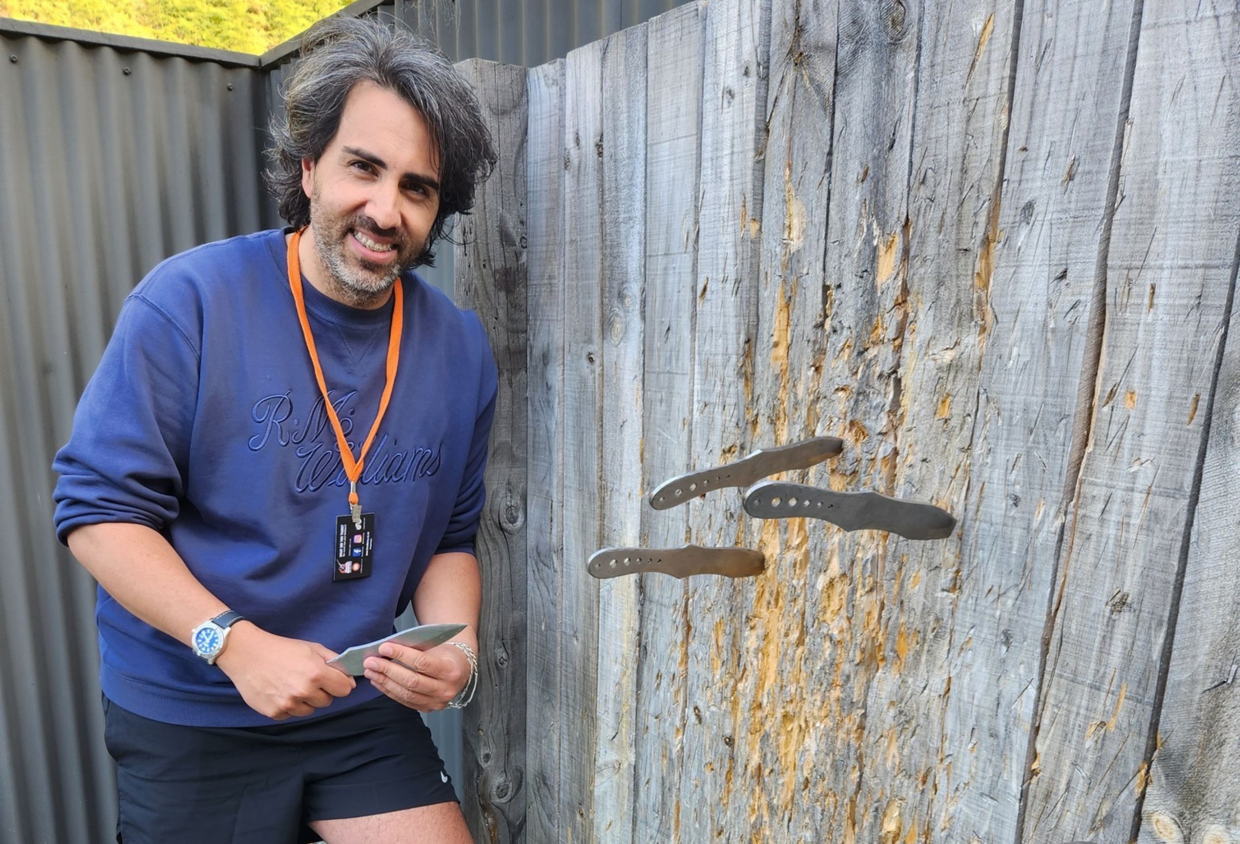 Guest throwing a knife at a target during Break One Clay Target Sports - The Full Monty experience.